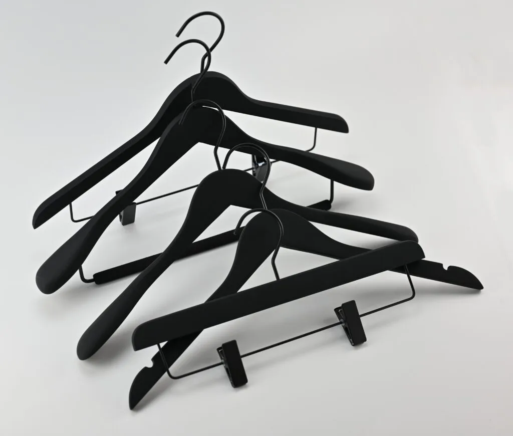 Black wooden hangers with matte finish, black metal hanger and trouser hanger with clips