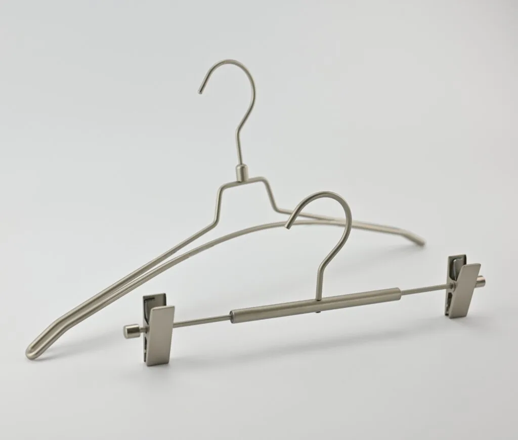 Metal hanger with trouser clips in brushed steel for trousers and skirts